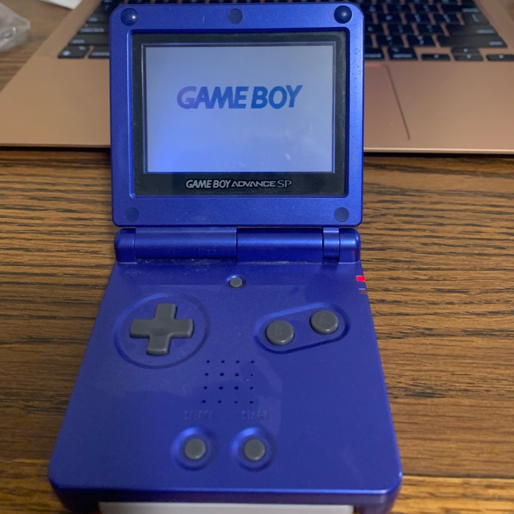 Nintendo gameboy advance SP with game cartridges